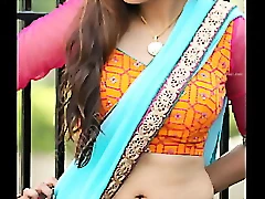 Saree-clad teen's belly button gets attention in erotic plan.